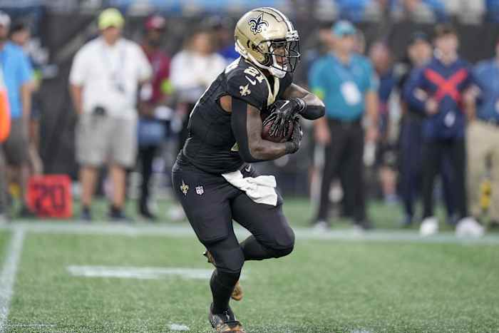 New Orleans Saints running back Jamaal Williams (21) runs against the Carolina Panthers. Mandatory Credit: Jim Dedmon-USA TODAY Sports